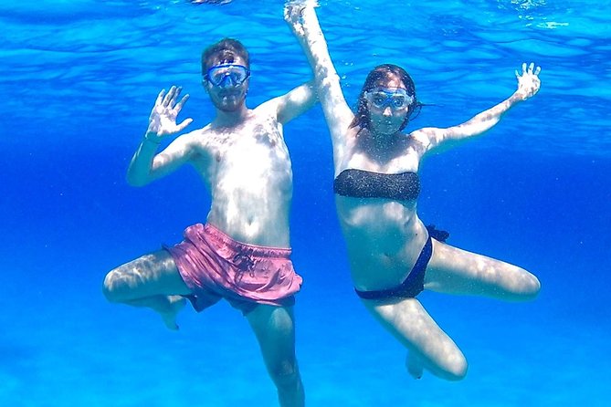 Boat Tour Egadi Day discover Favignana and Levanzo from Trapani - Cala Rossa, beautiful water and a longer swim