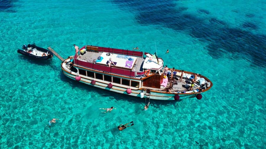 Boat Tour to Caprera and La Maddalena Archipelago - Leaving Palau and crossing toward Caprera