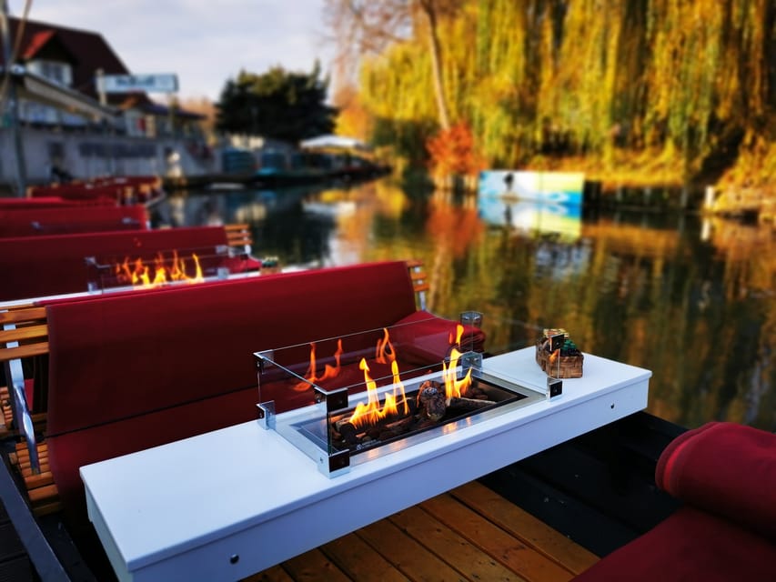 Burg: Spreewald Winter Cruise with Fireplace - A fire on the Spreewald waterways