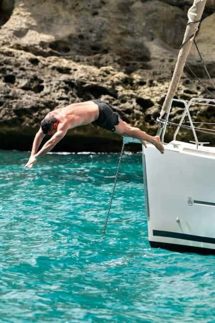 Cagliari: Catamaran Tour, Swimming, Snorkeling, & Prosecco - Cala Fighera offers more time in the water