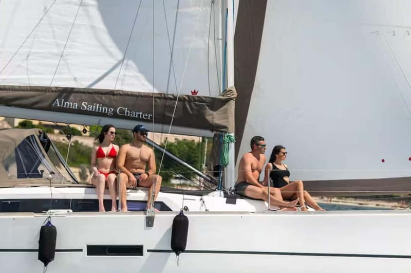 Cagliari: Catamaran Tour, Swimming, Snorkeling, & Prosecco - Cala Bernat gives you your first coastal view