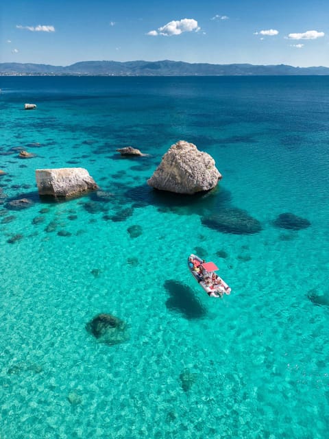 Cagliari: Devil's Saddle Boat Tour with Spritz and Chips - Calamosca, a gentle first swim