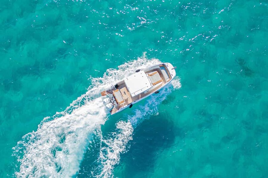 Cagliari: Luxury Motorboat Tour with 3 Swim Stops & Wine - What the boat provides, and what you should bring