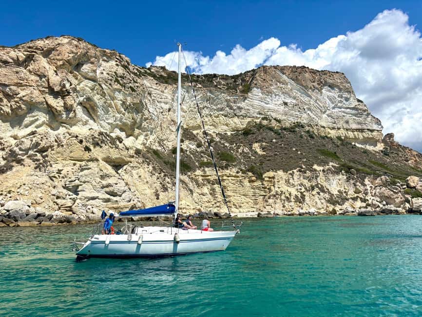 Cagliari Sailing Boat Tour with Snorkeling and Drink - Cala Fighera and the longer 45-minute stop