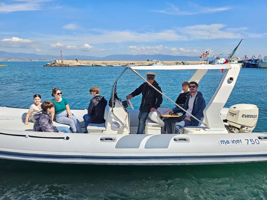 Cagliari: Sella del Diavolo Boat Magic Tour Drinks & Snacks - Leaving Poetto for Sella del Diavolo