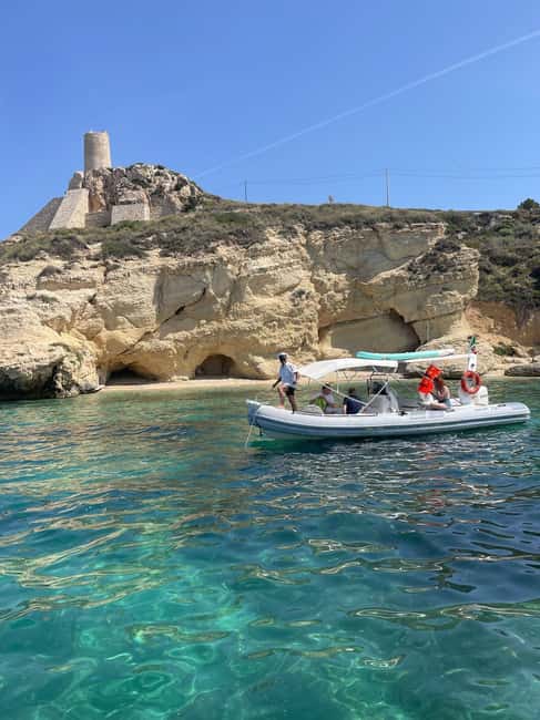 Cagliari: Sella del Diavolo Boat Magic Tour Drinks & Snacks - Swimming, snorkeling, and feeding the fish