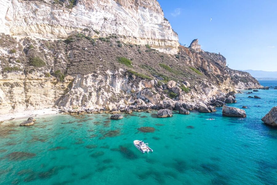 Cagliari: Zodiac Boat Tour, 3-4 SwimStops, Wine & Snorkeling - Wine, music, and the skipper’s role