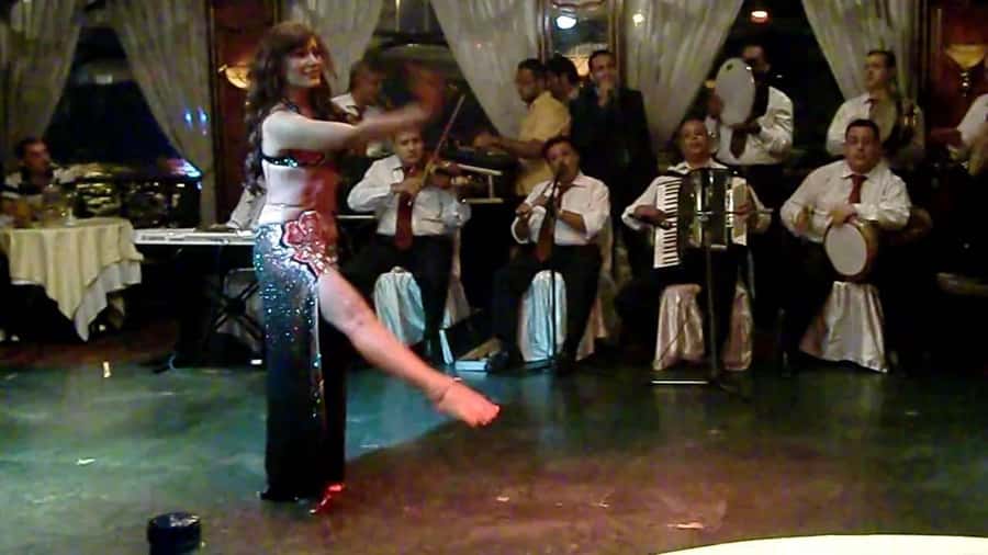 Cairo: Nile Dinner Cruise with Belly Dancer Show with Pickup - Sunset, city lights, and the Cairo skyline