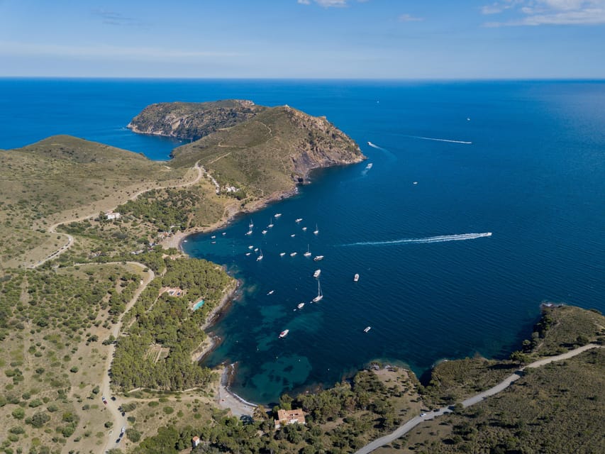 Cap Norfeu: Costa Brava Catamaran Trip with Underwater Views - Audio commentary and the onboard experience