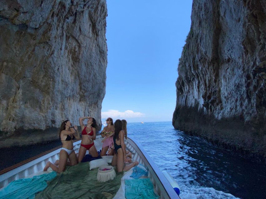 Capri: Island and Grottos Boat Cruise with Snacks and Drinks - Natural Arch, Villa Malaparte, and Punta Carena