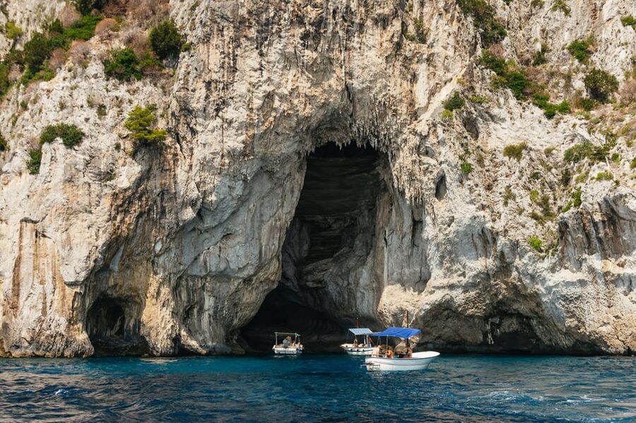 Capri: Island Boat Tour and Optional Blue Grotto Visit - Tiberius’s Leap and the eastern coast