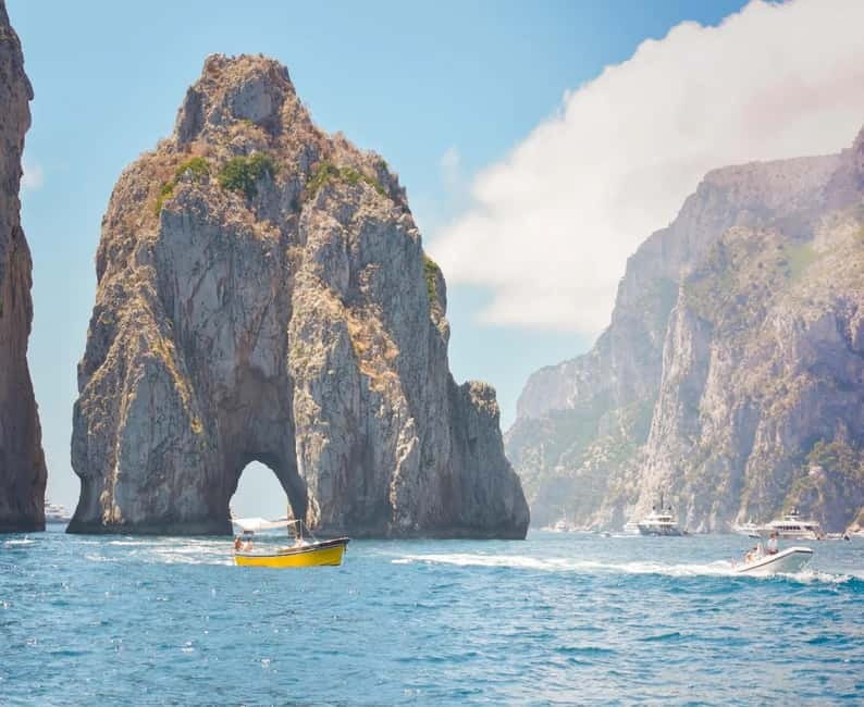 Capri: Scenic Boat Tour with Swimming, Limoncello & Snack - Natural Arch and the coast’s sculpted rock