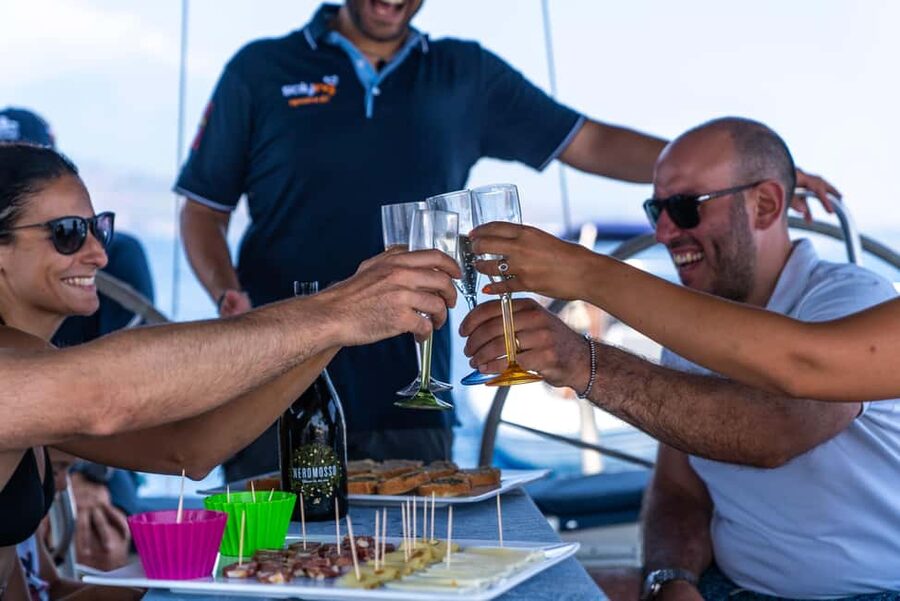 Catania: Cyclops Coast Cruise with Appetizer & Snorkeling - The Sicilian aperitif aboard the boat