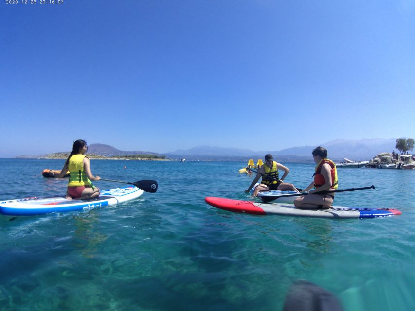 Chania: Boat Trip with Guided Snorkeling & Stand-Up Paddling - Stand-up paddling at the third stop