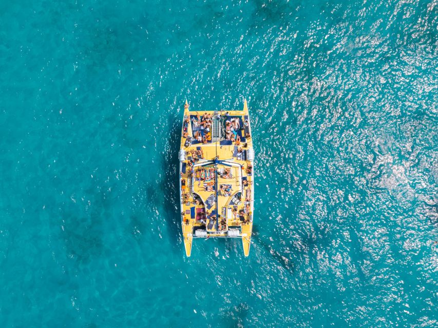 Comino: Blue Lagoon Catamaran Cruise with Lunch and Open Bar - Reaching the Blue Lagoon by catamaran