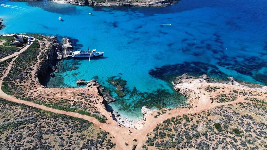 Comino: Blue Lagoon & Caves Boat Cruise - Food, drinks, and the famous pineapple cocktail