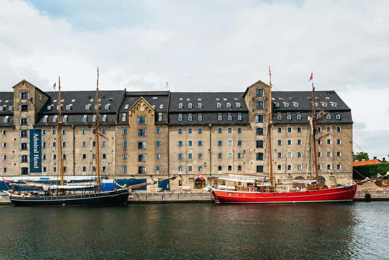 Copenhagen: Old Canals and Hidden Gems Social Boat Tour - Returning to the old city canals