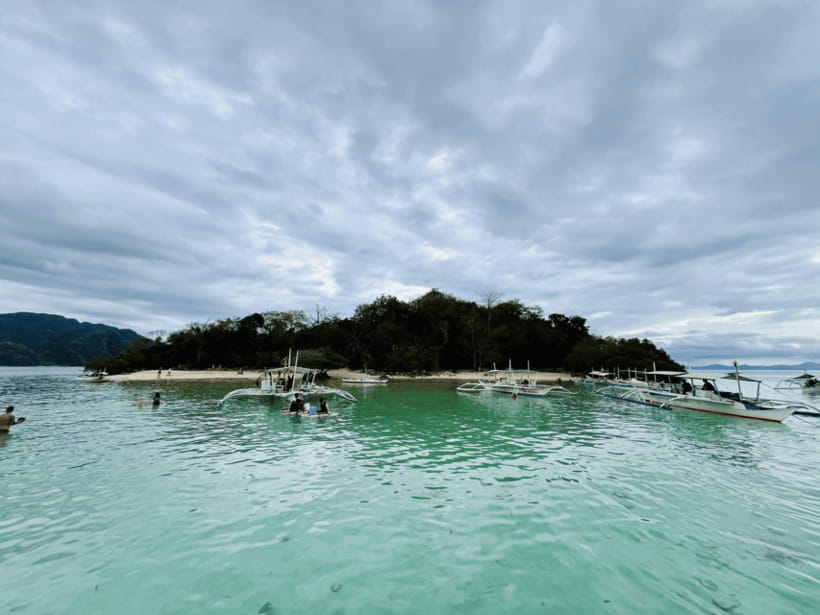 Coron: Private Boat Hire with Guided Tour and Lunch on Beach - What the eight-hour day feels like