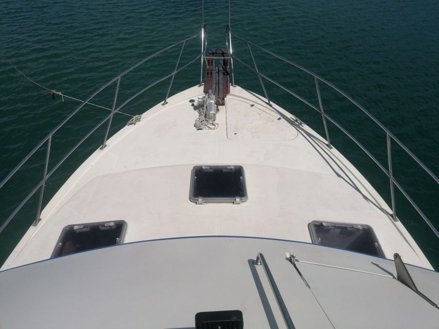 Crete: Snorkeling Boat Trip with Lunch and Transfer - The Second Stop: Fish, a Small Beach, and a Cave