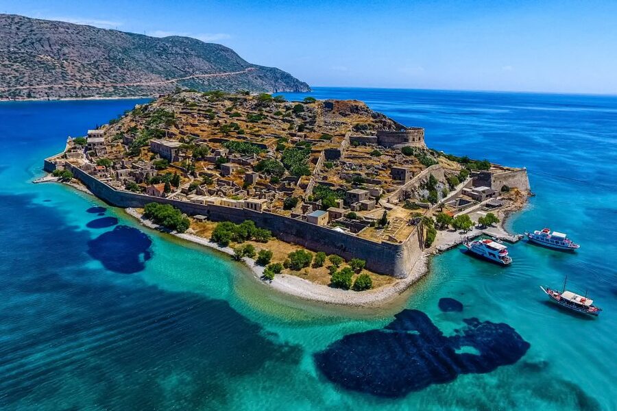 Crete: Spinalonga, Elounda, & Agios Nikolaos Boat Tour & BBQ - Crossing Mirabello Bay to Spinalonga