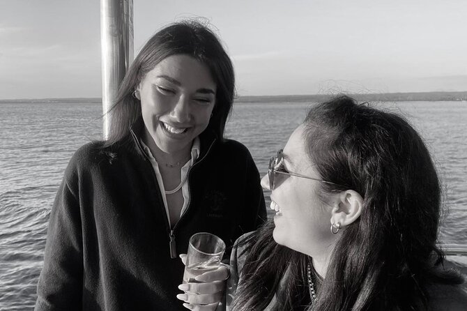 Dolphin Watching & Sunset Boat Tour With Dinner and Drinks - Dolphin watching without a guarantee