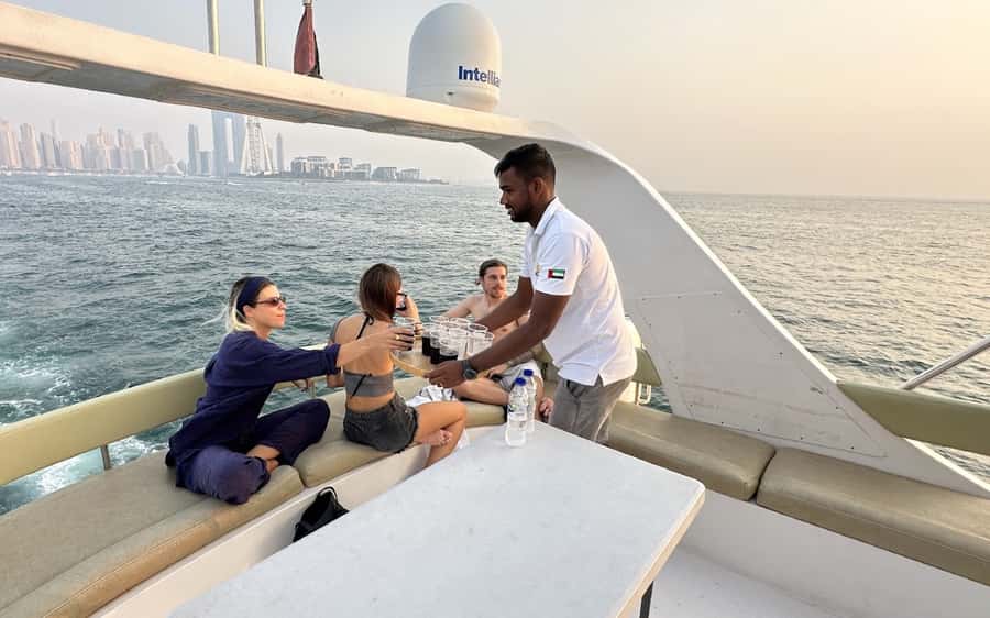 Dubai: Luxury Sunset Yacht Tour with Snacks and Drinks - Food, drinks, and onboard atmosphere