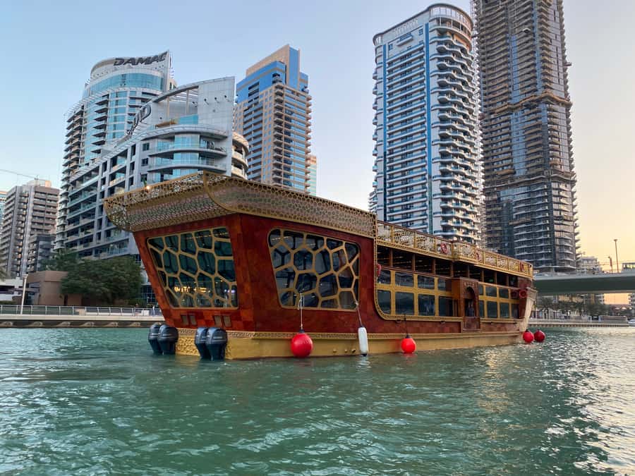 Dubai Marina: Dinner Cruise in a Traditional Boat - Dubai Marina by night
