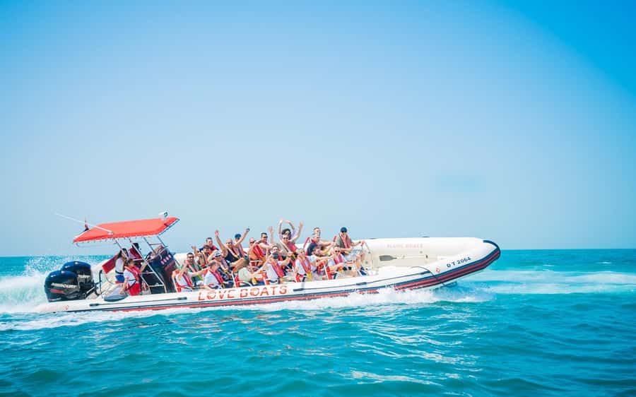Dubai: Sightseeing Speedboat Tour with Live Tour Guide - Leaving Dubai Marina at a controlled pace