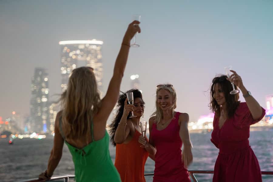 Dubai: Sunset & Night Cruise with Bites and Drinks - The drinks package and onboard atmosphere