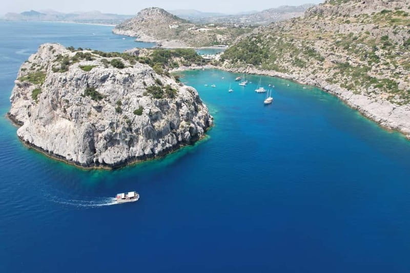 Faliraki: Boat Trip to Anthony Quinn & The Caves with Drinks - Finding the yellow boat from Faliraki beach