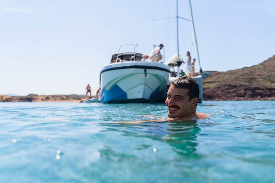 Fornells: 3-Hour Boat Tour Along Menorcan Coast - Two stops for swimming and snorkeling