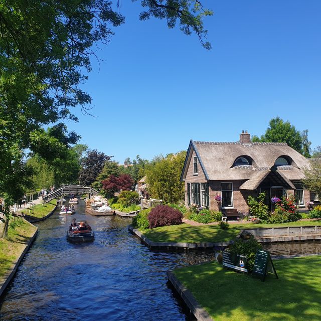 From Amsterdam: Giethoorn Day Trip with Small Electric Boat - Walking across bridges and man-made islands