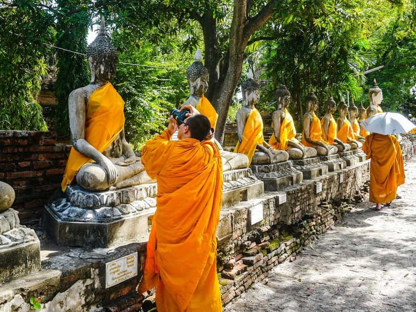 From Bangkok: Ayutthaya Heritage Tour with Sunset Boat Ride - Wat Yai Chai Mongkhon and its long rows of Buddhas