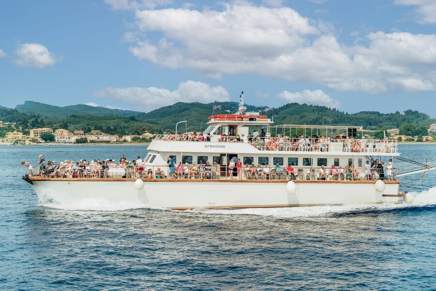 From Corfu Island: Antipaxos & Paxos Blue Caves Boat Cruise - Sailing past Corfu Town and the Kanoni Peninsula