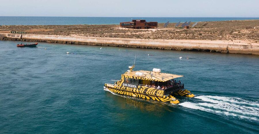 From Faro: Catamaran Boat Trip to Deserta Island with Stop - Arriving at Ilha Deserta