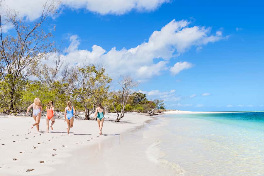 From Hervey Bay: Remote K'gari Tour by Boat with Lunch - Wathumba Creek: snorkeling, swimming, and sand