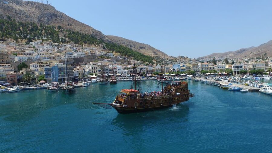 From Kos: 3-Island Pirate Cruise with Lunch and Waterslide - Leaving Kos Harbour on the Barco de Pirata
