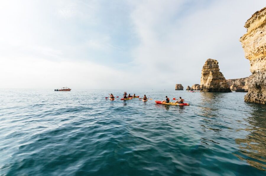 From Lagos: Kayaking and Boat Cave Explorer Tour - Swimming in the clear water