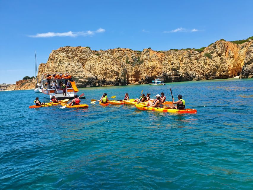 From Lagos: Ponta da Piedade Caves Kayak Tour from Catamaran - Sliding into a double kayak