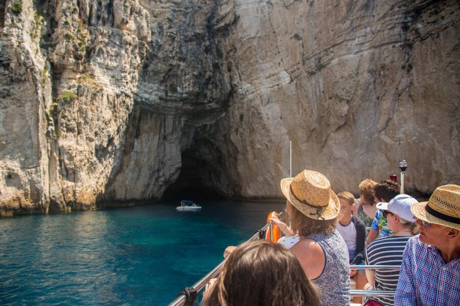 From Lefkimmi: Paxos, Antipaxos & Blue Caves Speedboat Tour - Swimming in the clear water near Antipaxos