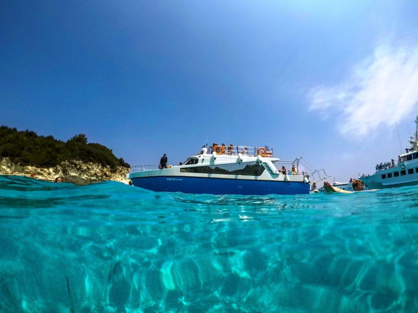From Lefkimmi: Syvota, Blue Lagoon and Cave Sunset Cruise - Swimming at the Blue Lagoon