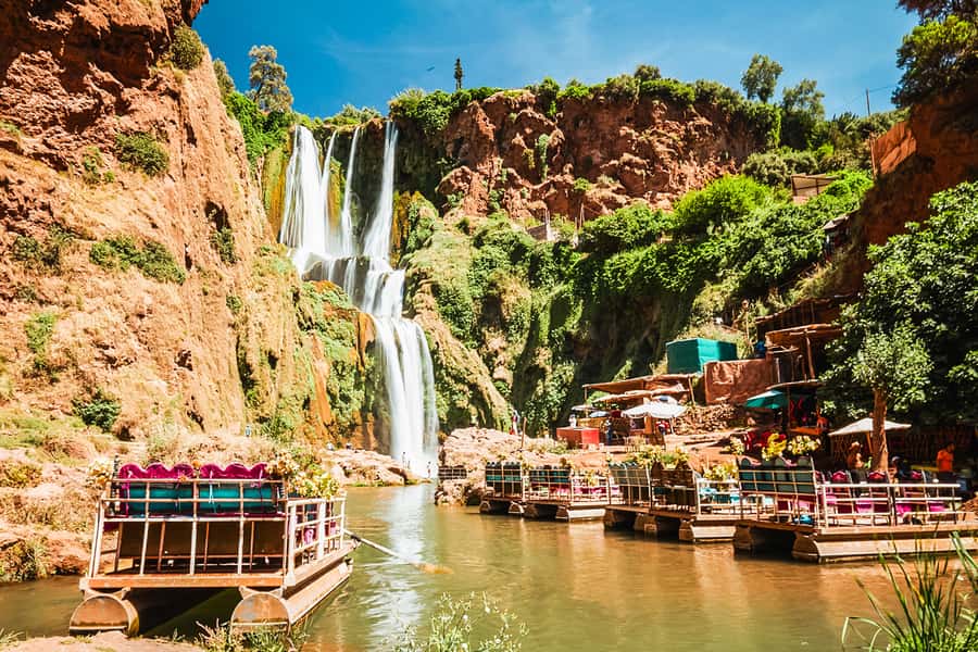 From Marrakech: Ouzoud Waterfalls Guided Tour & Boat Ride - Barbary macaques, olive trees, and local sellers