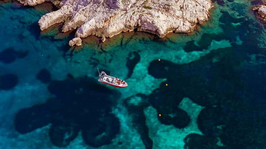 From Marseille: Iconic Calanques Boat Tour with Swimming - What the small group changes