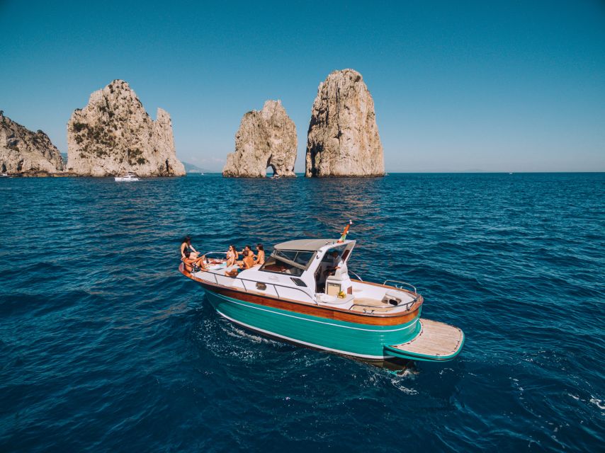 From Naples: Capri Boat Day Trip with Drinks - Capri from the sea: caves, cliffs, and Casa Malaparte