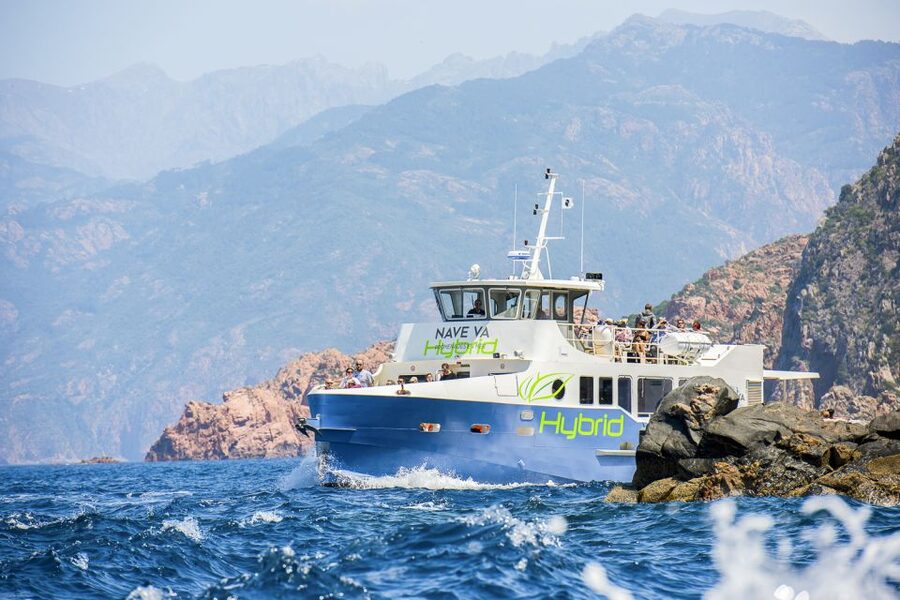 From Ota: Scandola Nature Reserve Eco-Friendly Boat Tour - The hybrid boat, seating, and comfort