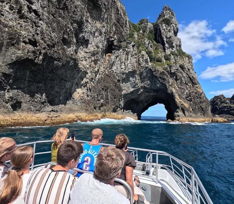 From Paihia: Scenic Cruise with Roberton Island Stopover - Cruising toward Cape Brett Lighthouse
