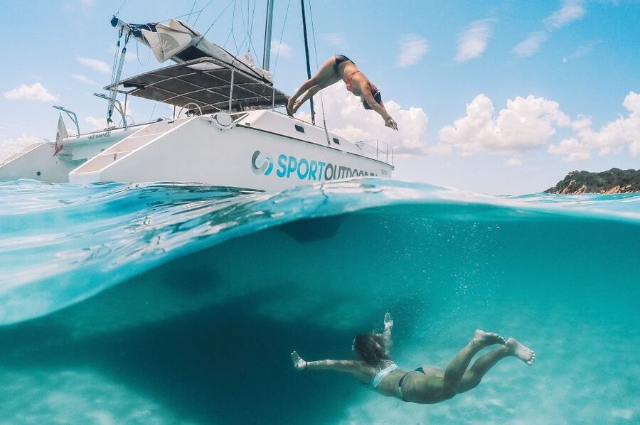 From Palau: La Maddalena Full-Day Archipelago Catamaran Tour - Lunch, wine, and the social side of the boat