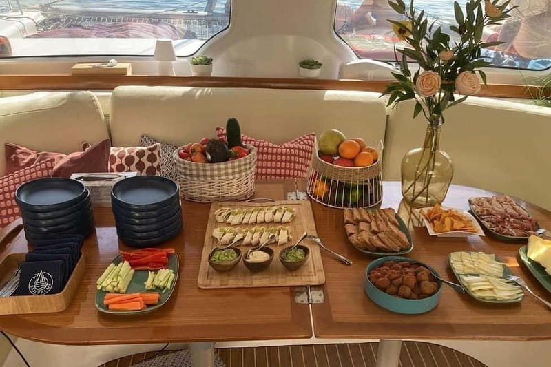 From Palma: Luxury Catamaran Group Tour with Tapas & Drinks - Leaving La Lonja Marina for open water