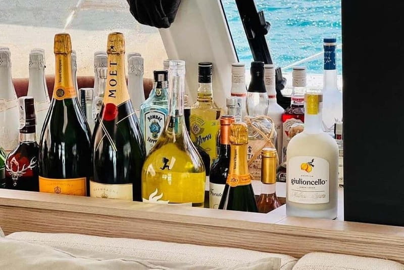 From Palma: Luxury Catamaran Group Tour with Tapas & Drinks - When the weather changes the plan