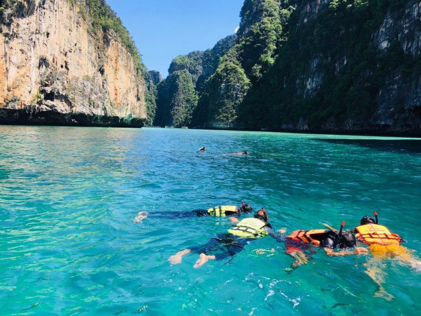 From Phi Phi: Half-Day Longtail Boat Tour with Snorkeling - Maya Bay: beautiful, crowded, and worth understanding